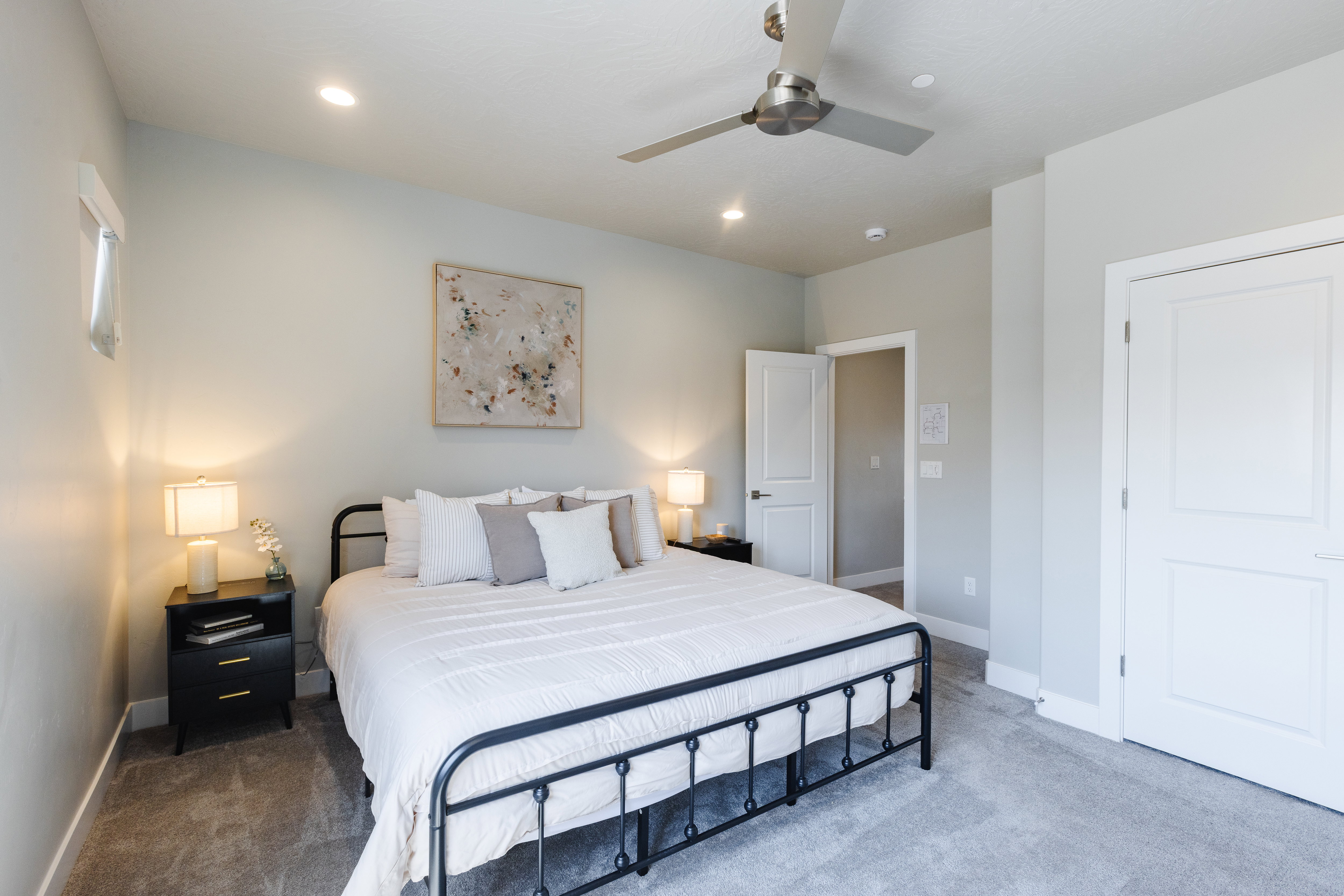 Bedroom featuring carpet floors, ceiling fan, and recessed lighting