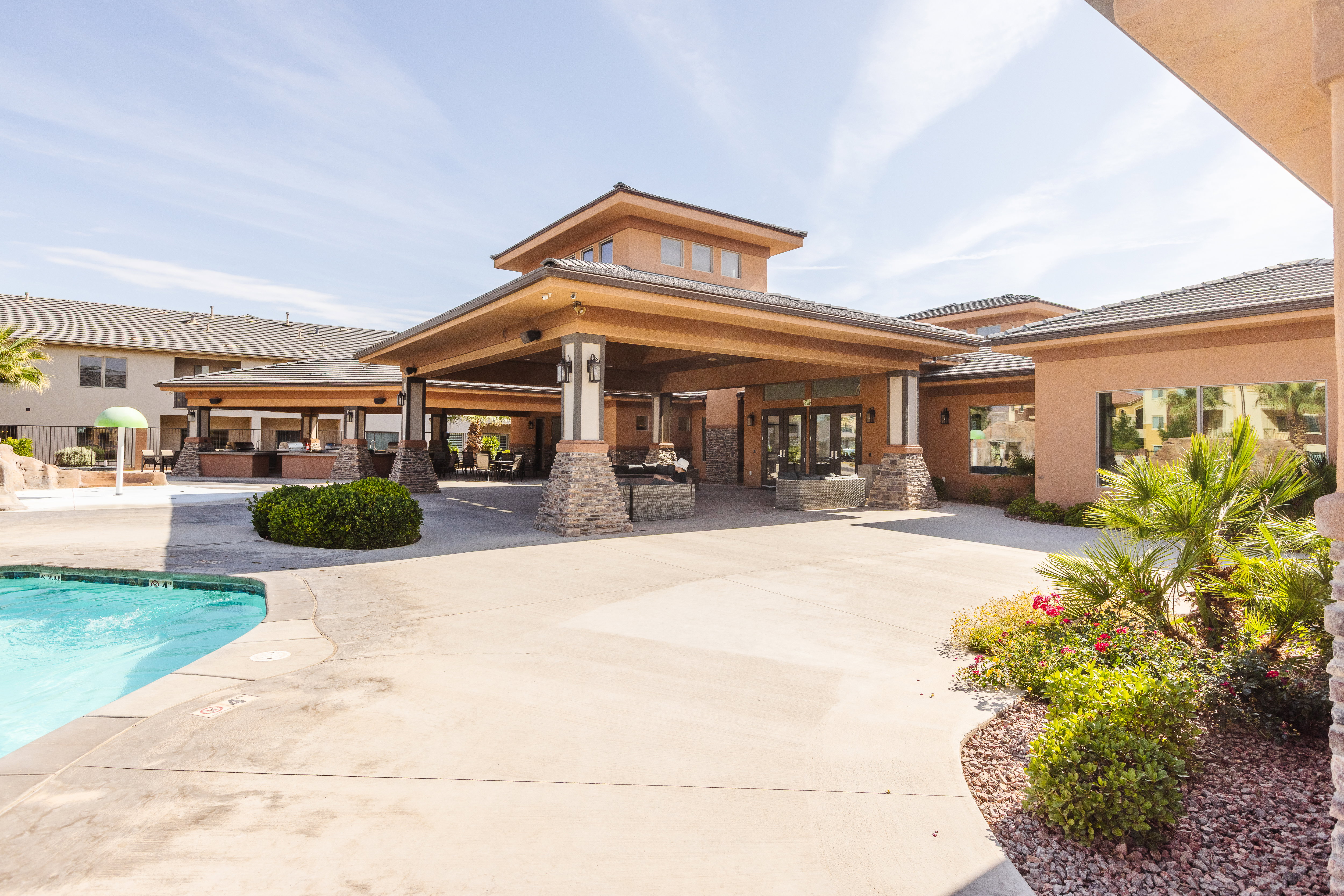 Community pool with a patio area