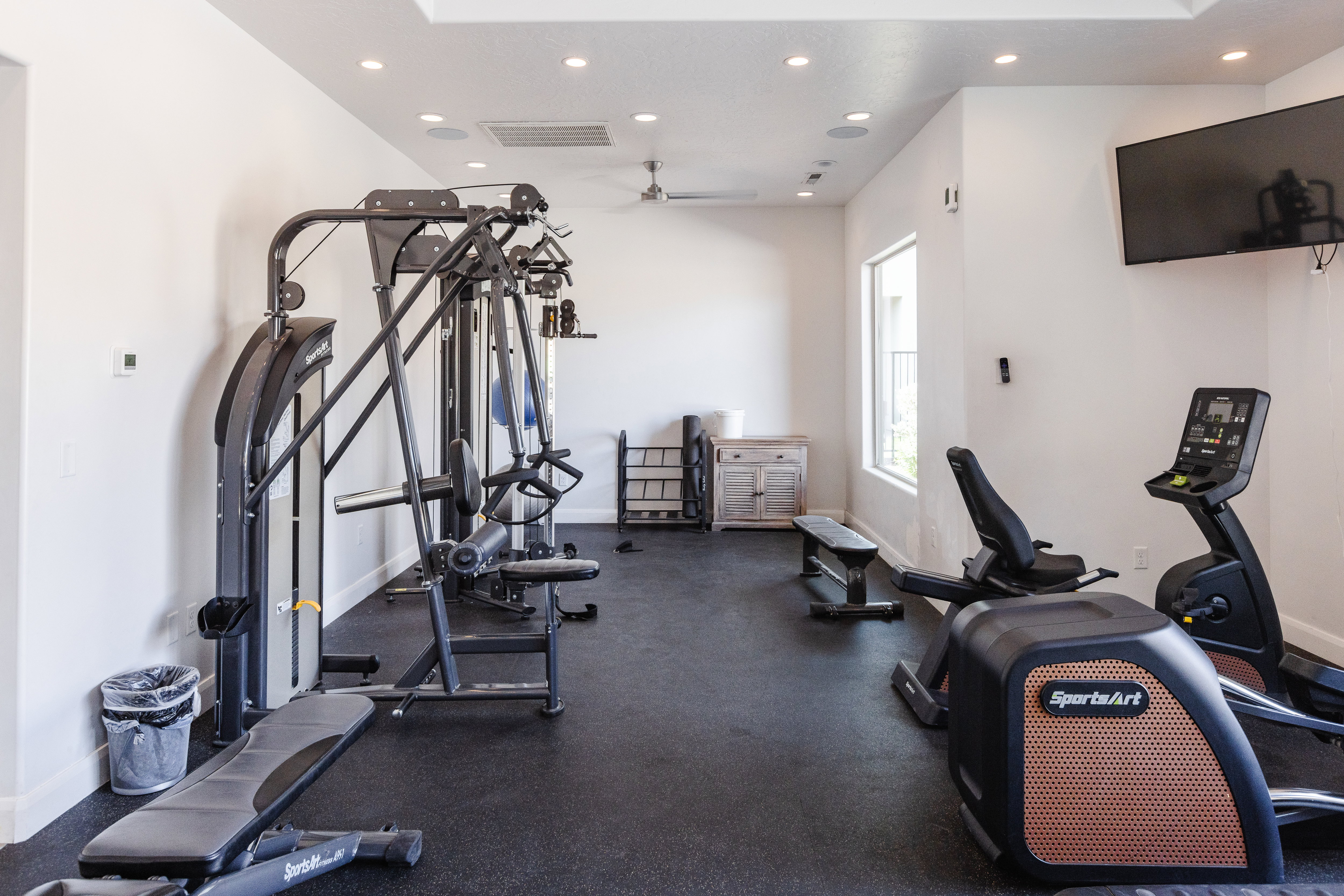Workout area featuring recessed lighting and ceiling fan