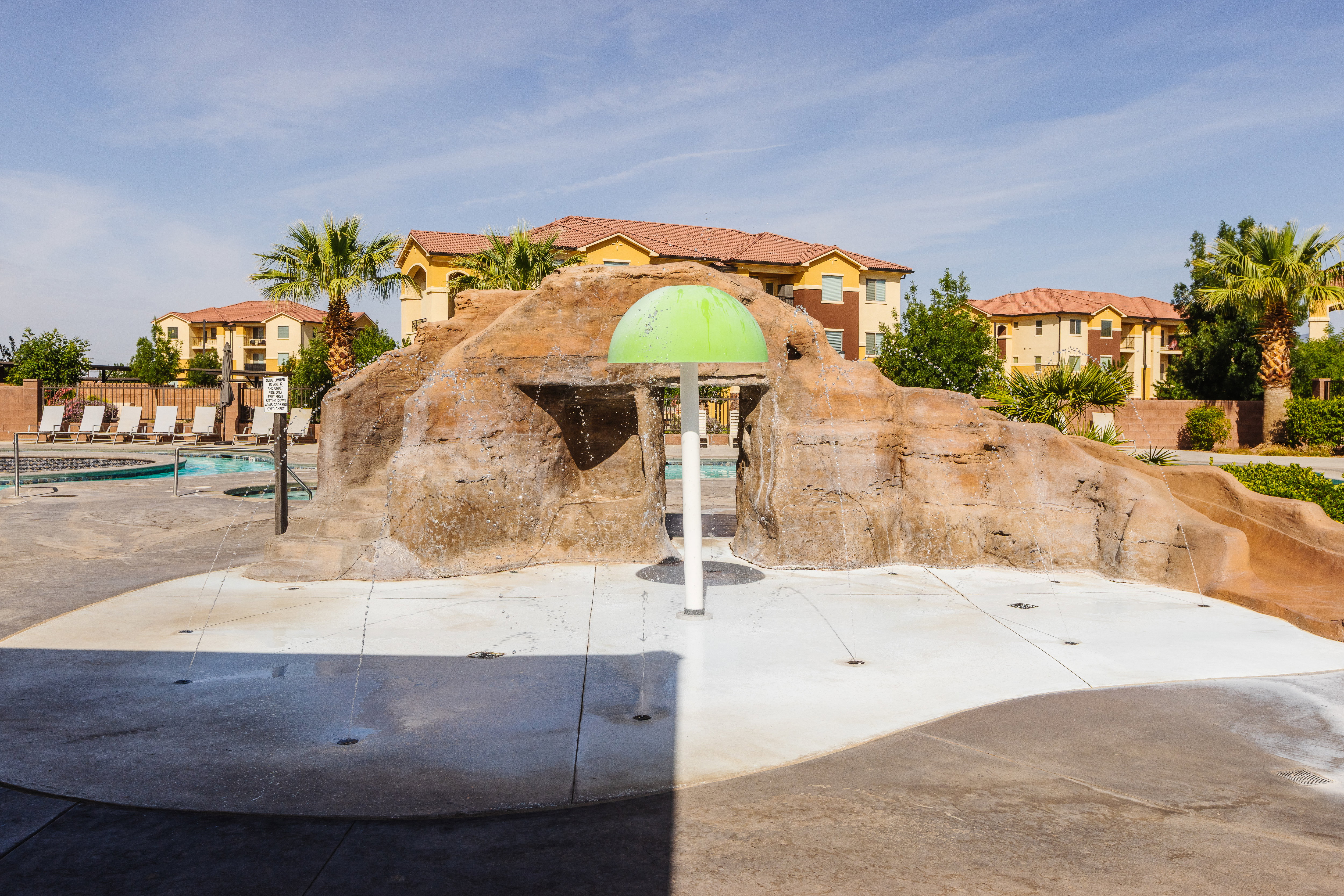 View of home's community with a pool and a residential view