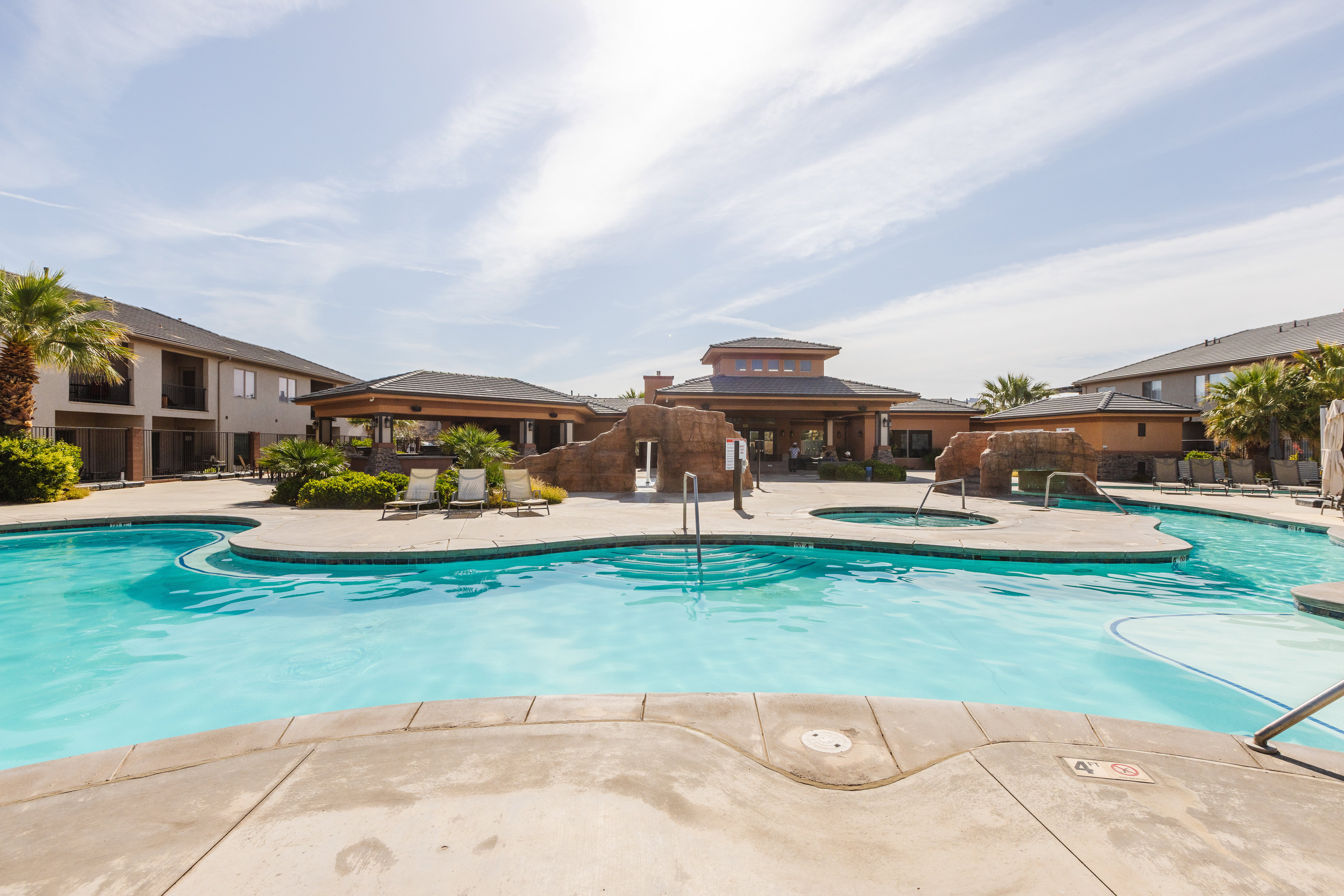 Community pool featuring a patio area and a gazebo