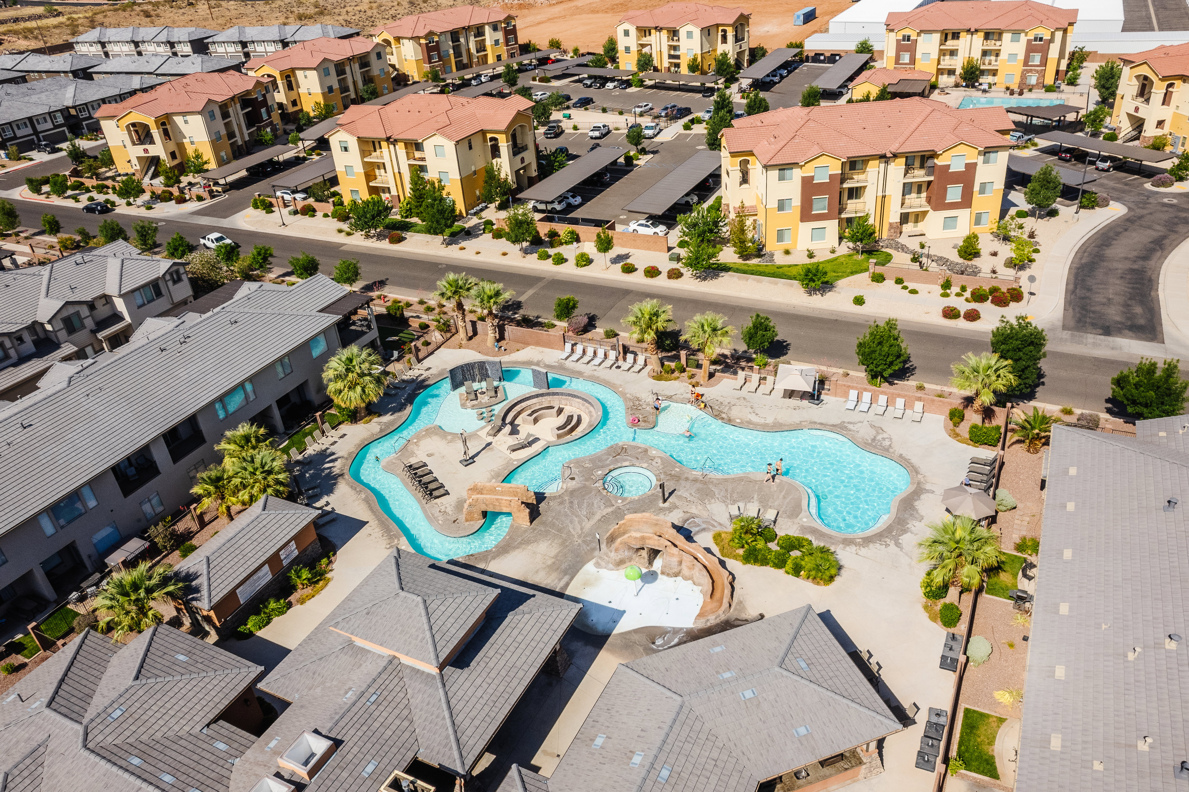 Aerial perspective of suburban area with a pool