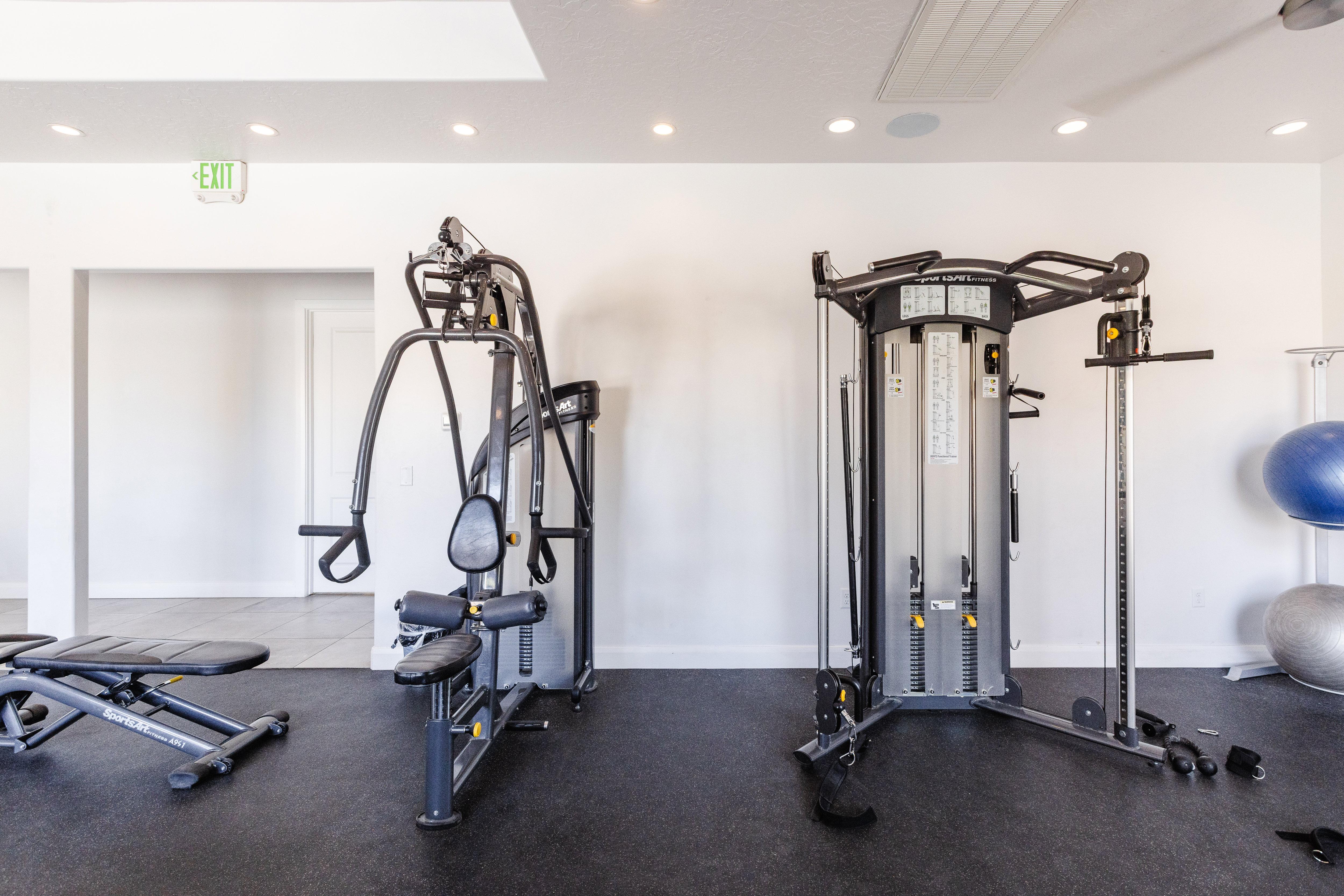Workout area featuring recessed lighting