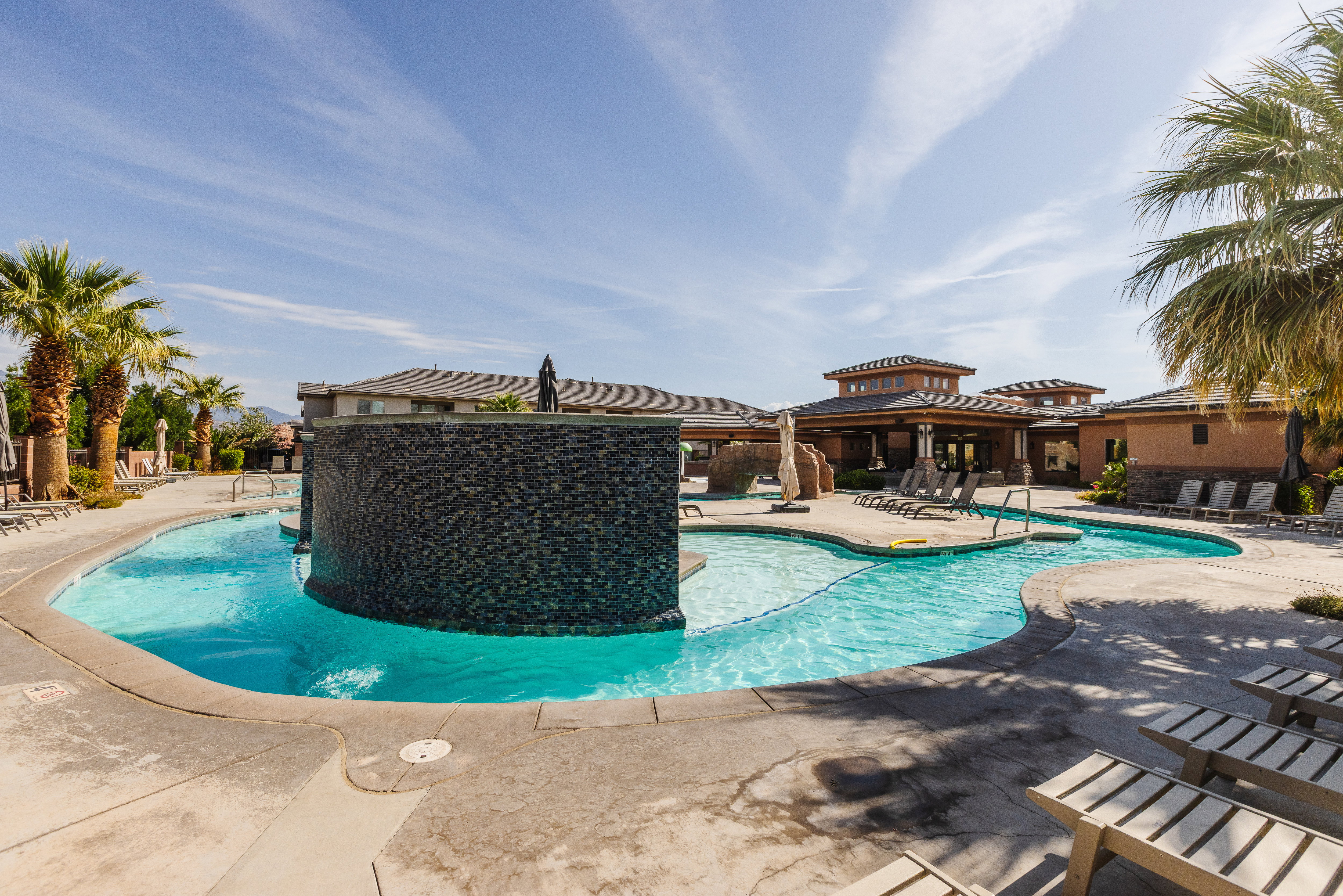 Community pool featuring a patio area and a gazebo