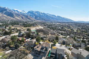 Aerial view of residential area with a mountain backdrop