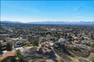 Aerial view of residential area with a mountainous background