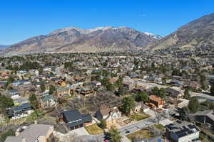 Aerial view of residential area with a mountainous background