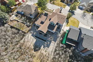 Aerial view of property's location with nearby suburban area