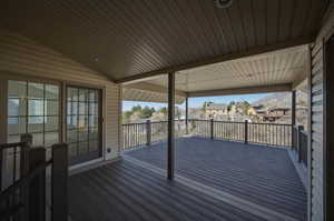 Wooden deck featuring a residential view