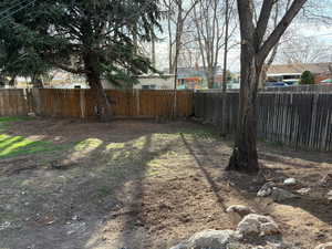 View of fenced backyard
