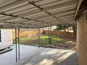 Fenced backyard featuring a patio area