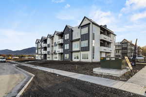 View of building exterior with a mountain view