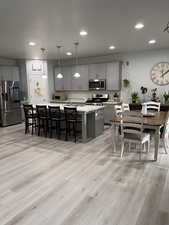 View of open layout of kitchen and dining room