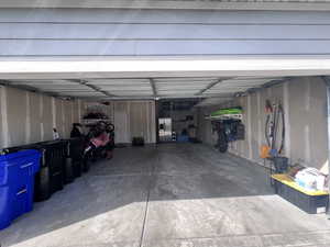 Garage with stainless steel fridge