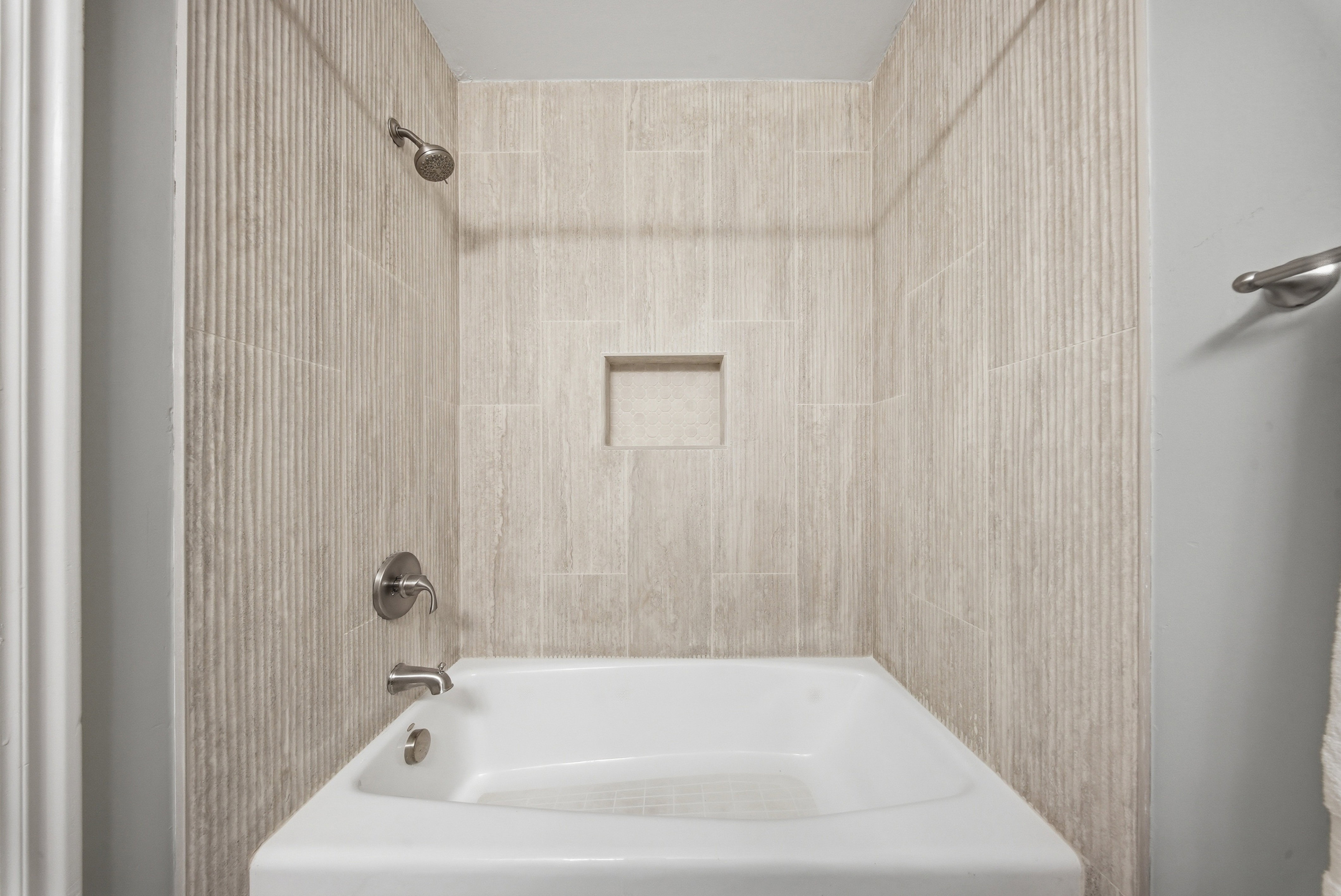 Full bathroom with shower / bathtub combination