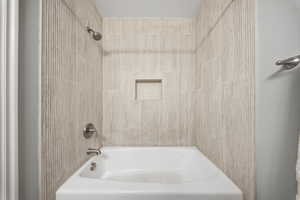 Full bathroom with shower / bathtub combination