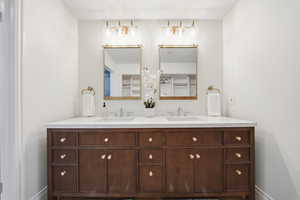 Bathroom featuring double vanity