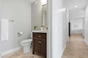 Bathroom featuring vanity and recessed lighting