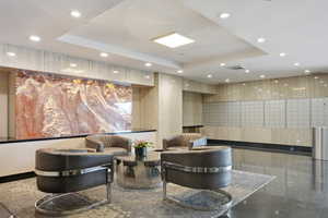 Building lobby with a tray ceiling and recessed lighting