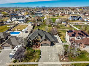 Aerial view of residential area featuring a mountain backdrop