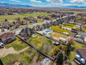 Aerial view of residential area featuring mountains