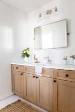 Bathroom with vanity and light tile patterned flooring