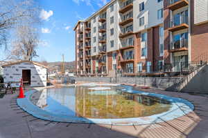 Surrounding community featuring a pool