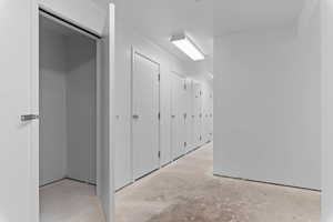 Hall featuring concrete floors
