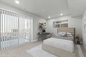 Carpeted bedroom with a desk, access to outside, and recessed lighting