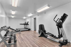 Workout area featuring a textured ceiling