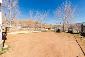 View of yard with a mountain view