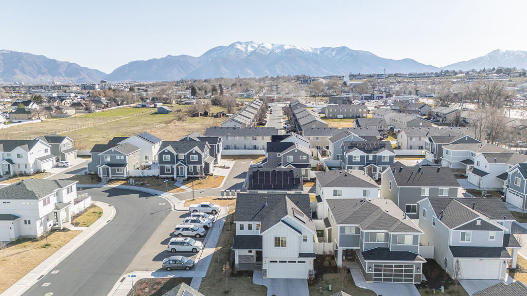 Aerial view of residential area with mountains