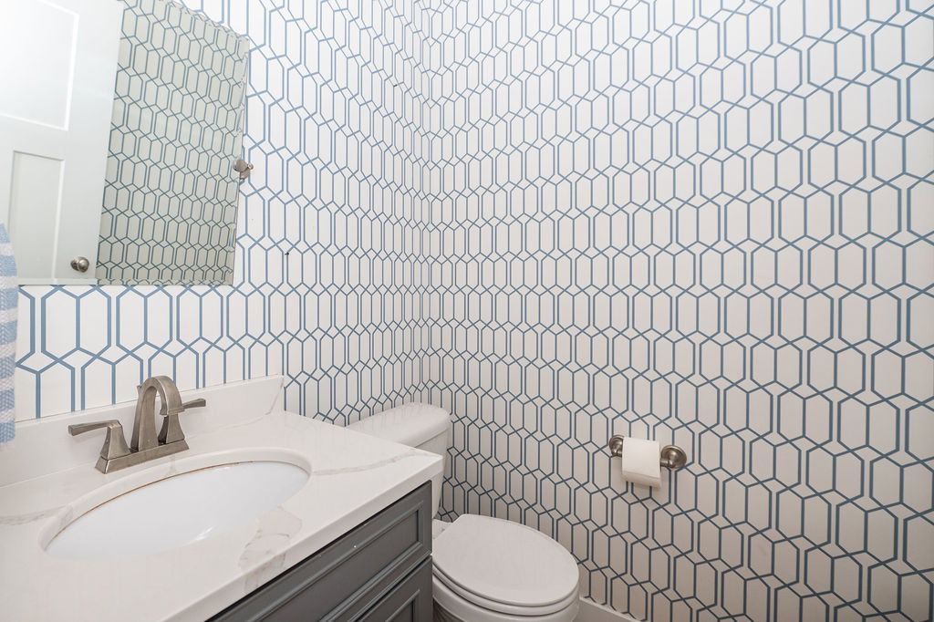 Bathroom with vanity and toilet