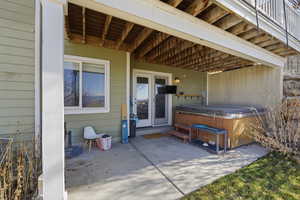 View of patio / terrace featuring a hot tub