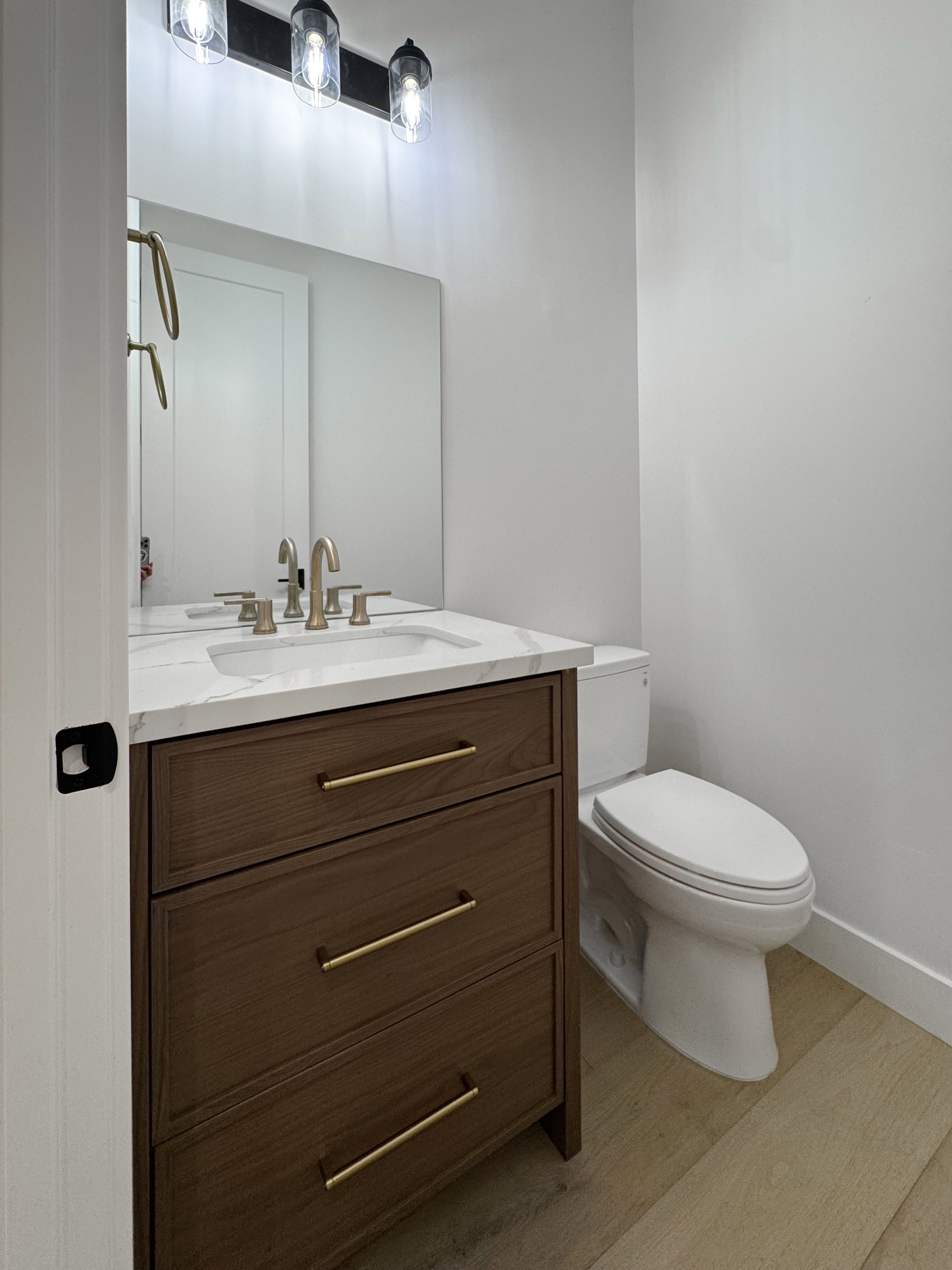 Bathroom with vanity and light wood-type flooring