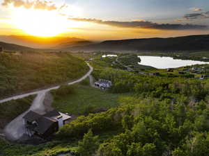 Aerial view at dusk of a water and mountain view
