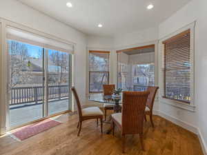 Dining room featuring wood finished floors and recessed lighting