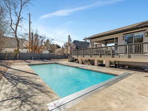Virtual staging used to show swimming pool open.