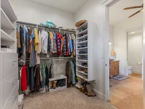 Primary bedroom walk-in closet