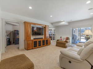Recreation room featuring recessed lighting and light carpet