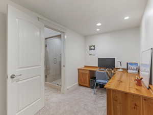 Office area featuring recessed lighting and light carpet