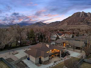 Aerial view at dusk of a mountain view and a residential view