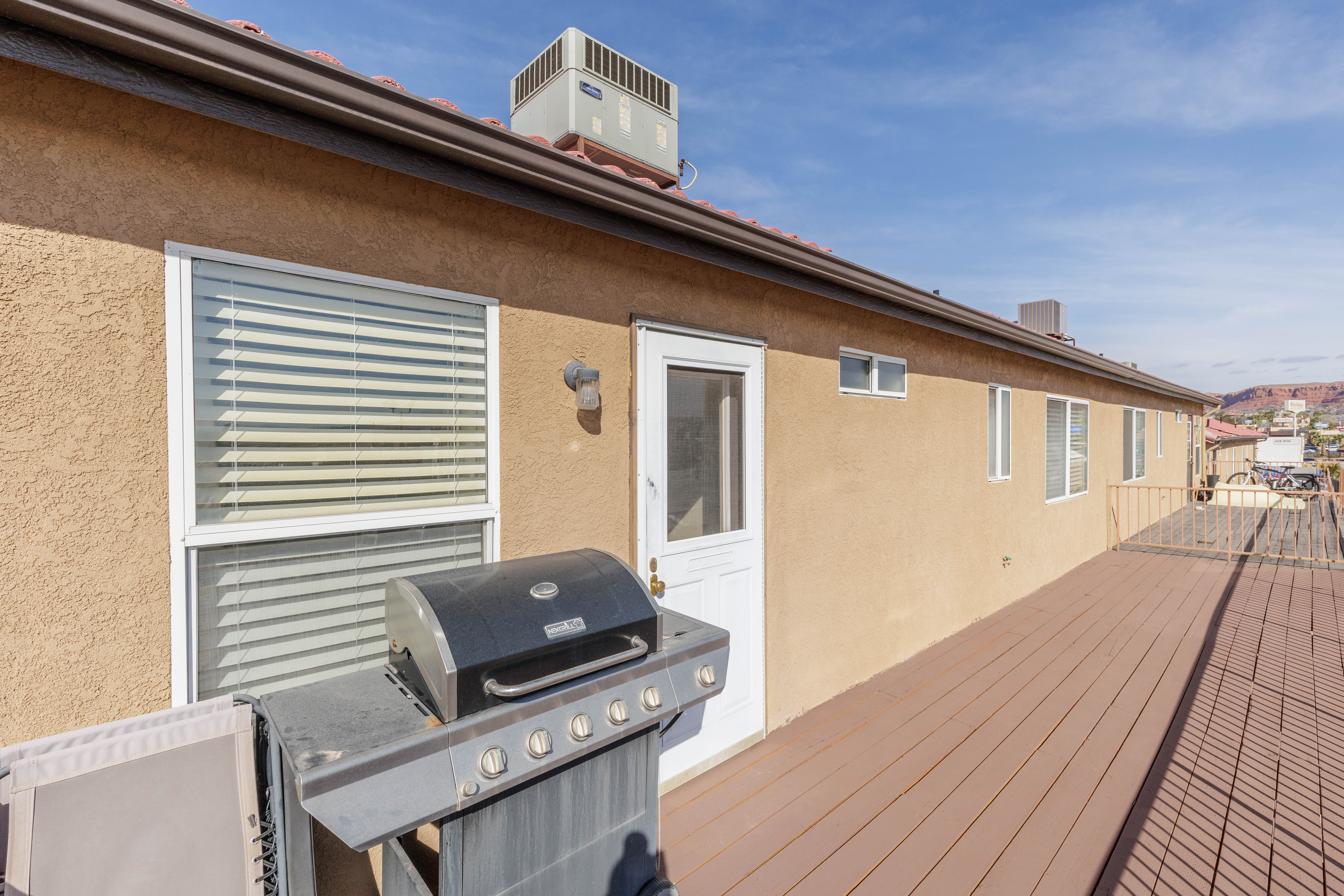 Wooden deck with a grill