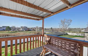 Wooden deck featuring a residential view
