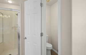 Master Bathroom Toilet Closet with Window and Fan