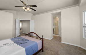 Master Bedroom with ceiling fan, lofted ceiling, and ensuite bath