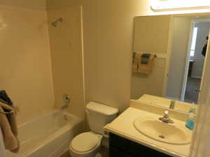 Full bath featuring vanity and shower / bathtub combination