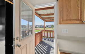 Porch featuring a residential view
