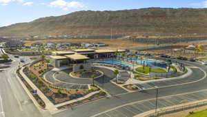 Bird's eye view of mountains and a pool area