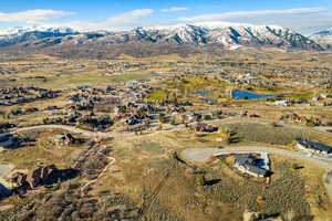Aerial view of residential area with a water and mountain view
